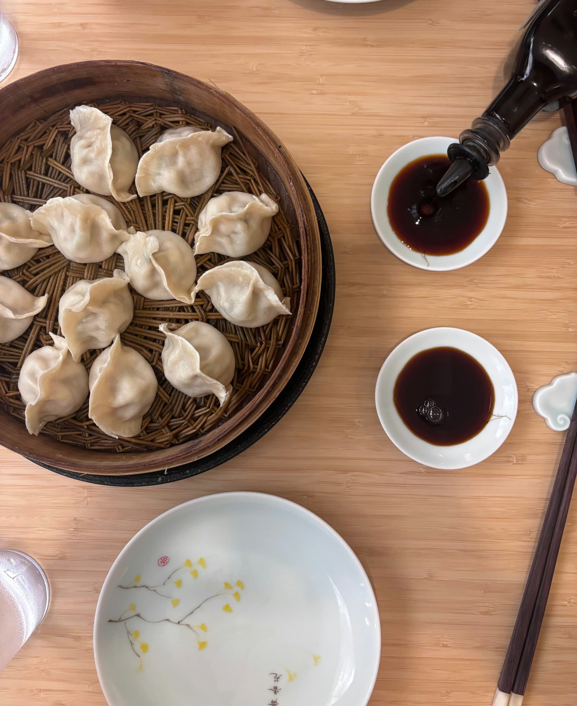 Freshly made dumplings arranged on a plate